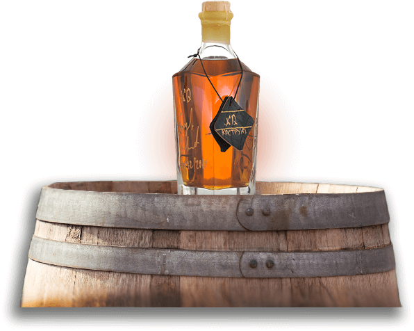 bottle of 27 years old cognac on barrel